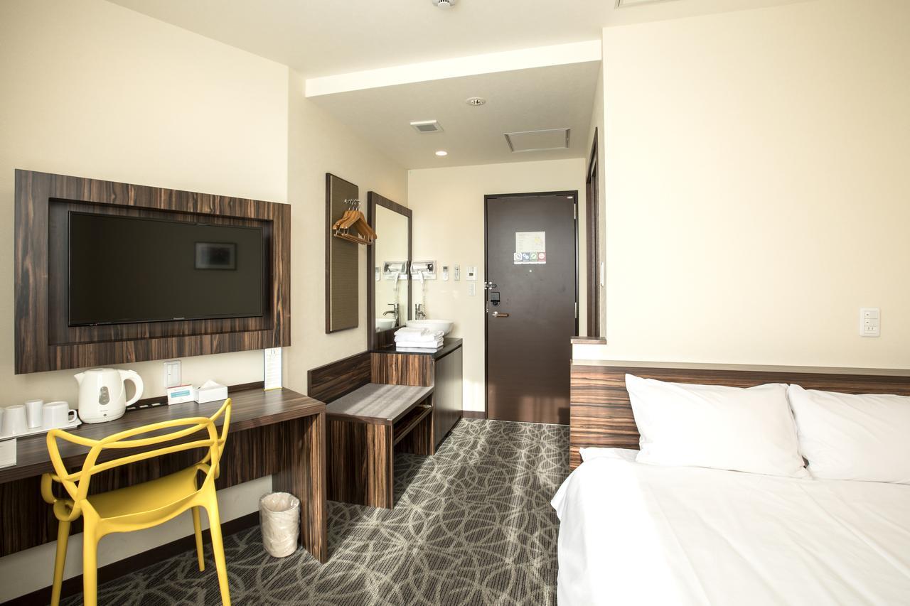 Hotel Okinawa Kariyushi Lch. Premium Naha Zimmer foto