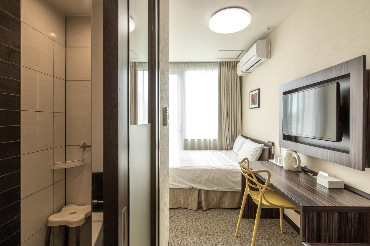 Hotel Okinawa Kariyushi Lch. Premium Naha Zimmer foto
